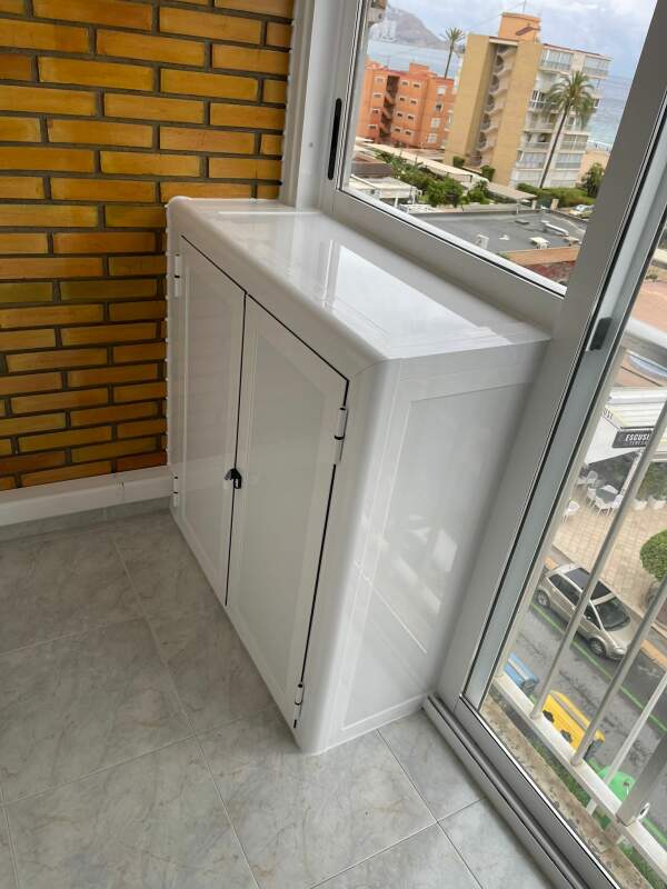 Aire acondicionado con caja protectora